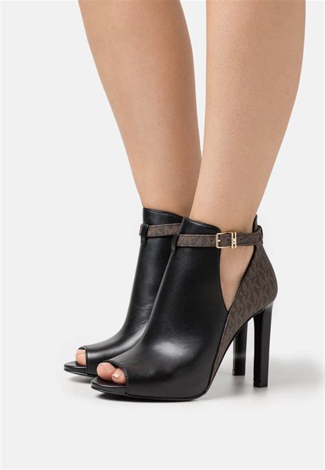 michael michael kors womens boots|Michael Kors heeled boots.